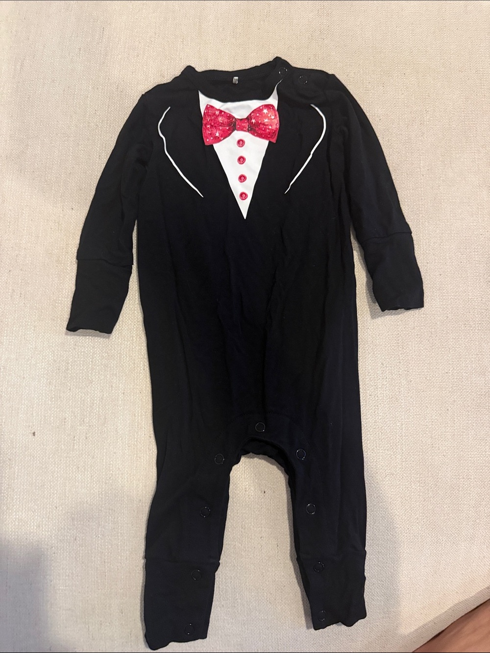 Posh Peanut Black One-Piece Tuxedo Romper with Red Bow